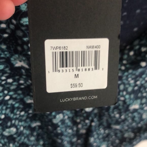 Lucky brand , Navy , size medium T shirt , button with bow on bottom - Picture 5 of 5